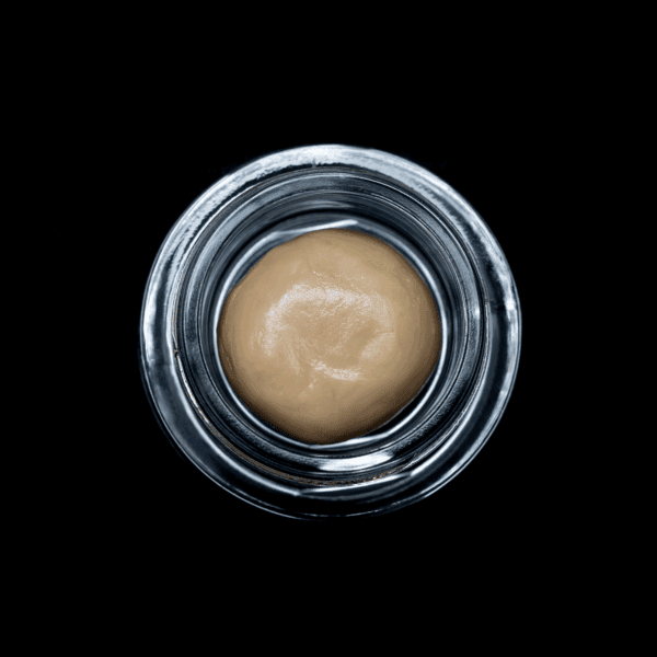 Premium Garlic Cocktail live THCA hash rosin in a 28-gram jar. Rich, potent, and flavorful concentra.