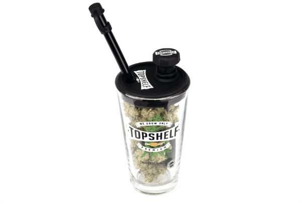 Marshmallow Mountain THCa Hemp Flower in a glass container with a dab tool.