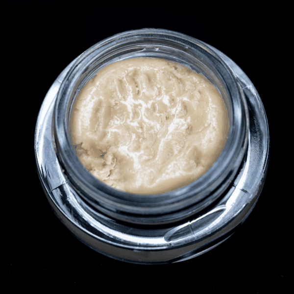 Hash rosin extract from Blue Dream strain in a glass jar.